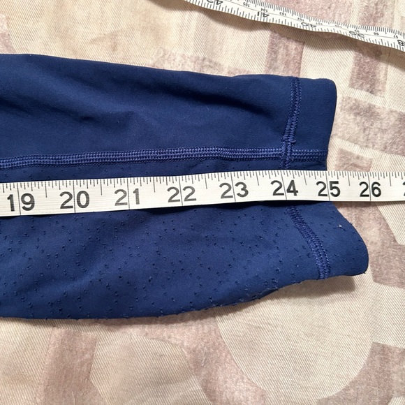 Lululemon navy leggings w/ laser cut design down sides - Picture 9 of 10